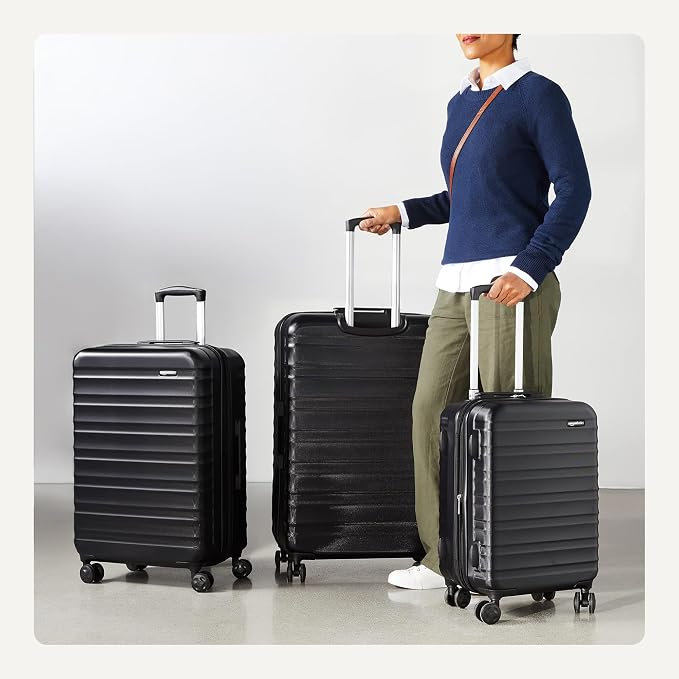 Amazon Basics 3-Piece Hardshell Luggage Set (21", 26", 30"), Scratch-Resistant Expandable Suitcases with Multi-directional Wheels and Telescoping Handle, Black - Image 3
