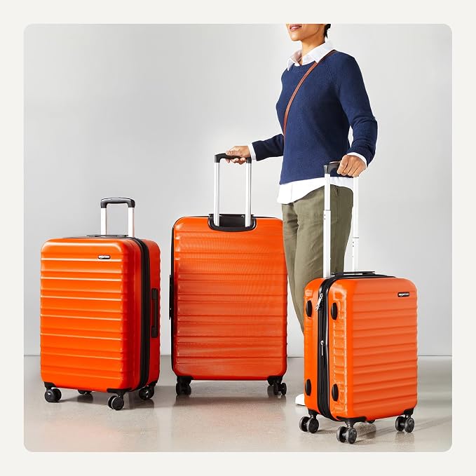 Amazon Basics 3-Piece Hardshell Spinner Luggage Set (21", 26", 30"), Expandable, Scratch-Resistant Surface, Four Multi-directional Wheels, Orange - Image 3