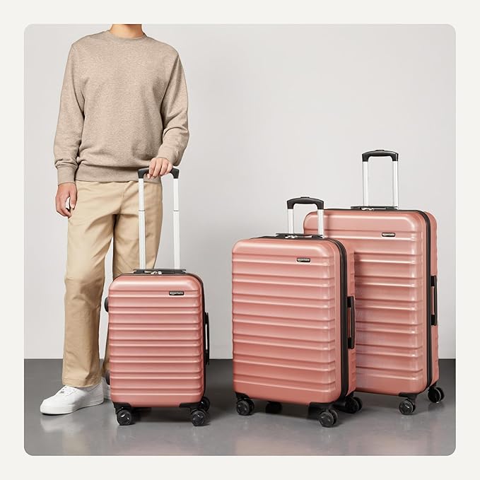 Amazon Basics 3-Piece Hardshell Suitcases Set (21", 26", 30"), Expandable For Up to 25% More Space, With Scratch-Resistant Finish, Four Multi-Directional Wheels, Rose Gold - Image 3