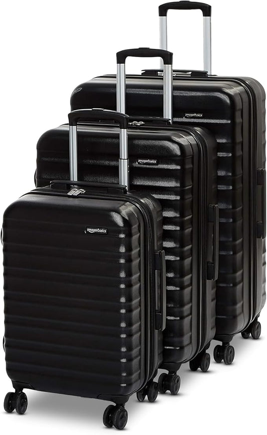 Amazon Basics 3-Piece Hardshell Luggage Set (21", 26", 30"), Scratch-Resistant Expandable Suitcases with Multi-directional Wheels and Telescoping Handle, Black by AmazonBasics