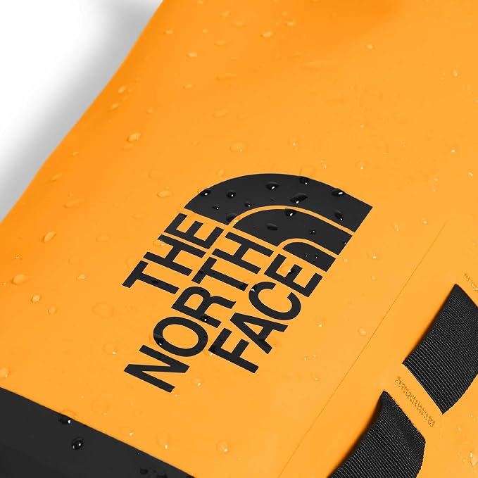 The North Face Base Camp Dry Bag - Roll-Top Waterproof Stuff Sack, Ideal for Camping Gear & Kayak Accessories, Summit Gold/TNF Black, 8 Liters | Roll-Top Waterproof Stuff Sack, Ideal for Camping Gear & Kayak Accessories - Image 2