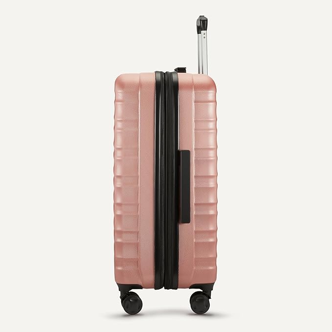 Amazon Basics 3-Piece Hardshell Suitcases Set (21", 26", 30"), Expandable For Up to 25% More Space, With Scratch-Resistant Finish, Four Multi-Directional Wheels, Rose Gold - Image 5