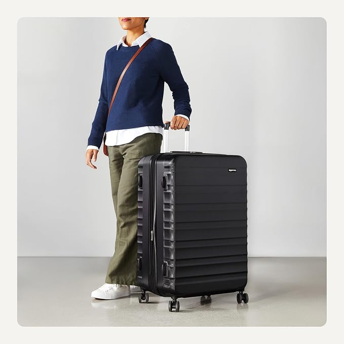 Amazon Basics 30" Hardside Large Checked Luggage, Hardshell Suitcase With Four Multi-directional Wheels, Expandable For Up to 15% More Space, Scratch-Resistant Shell, Black - Image 3