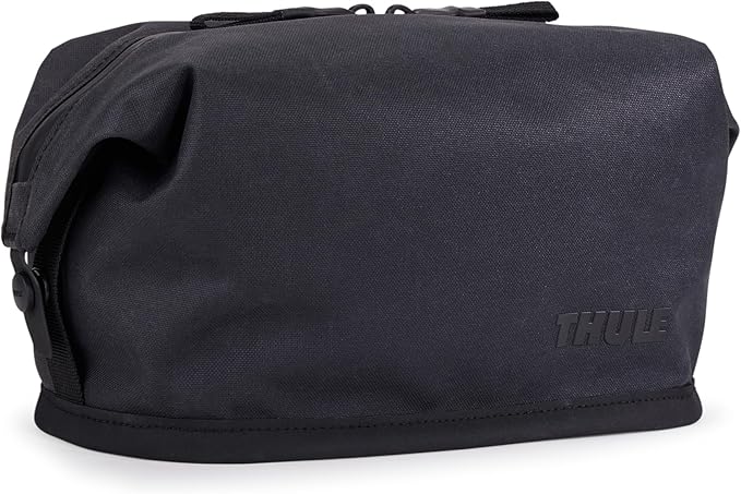 Thule Aion Toiletry Bag - Water-resistant bag for toiletries, makeup & shaving essentials - Removable liquids bag included - Easy to clean - Snap loop for easy hang - Waxed, PFC-free fabric by Unknown