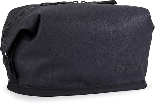 Thule Aion Toiletry Bag - Water-resistant bag for toiletries, makeup & shaving essentials - Removable liquids bag included - Easy to clean - Snap loop for easy hang - Waxed, PFC-free fabric by Unknown