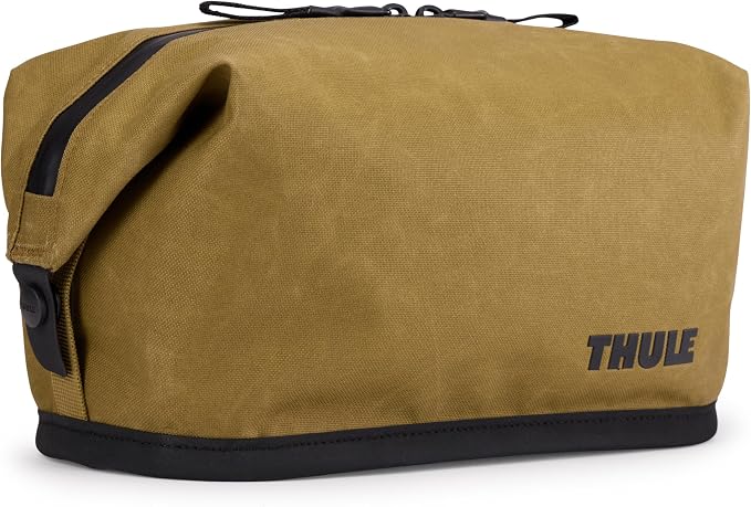 Thule Aion Toiletry Bag - Water-resistant bag for toiletries, makeup & shaving essentials - Removable liquids bag included - Easy to clean - Snap loop for easy hang - Waxed, PFC-free fabric by Unknown
