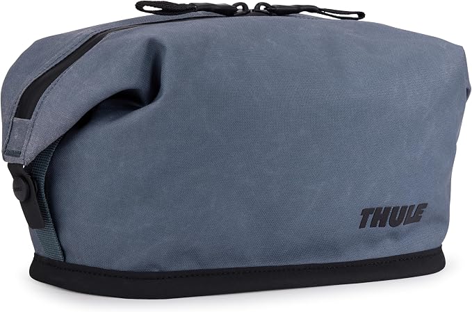 Thule Aion Toiletry Bag - Water-resistant bag for toiletries, makeup & shaving essentials - Removable liquids bag included - Easy to clean - Snap loop for easy hang - Waxed, PFC-free fabric by Unknown