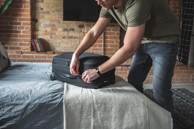 NOMATIC Navigator Carry-On 37L w/ 8L Built-In Expansion - Anti-Theft Carry-On for Airplane Travel - Premium Hardshell Roller Luggage, 17" Laptop Compartment, Black - Image 9